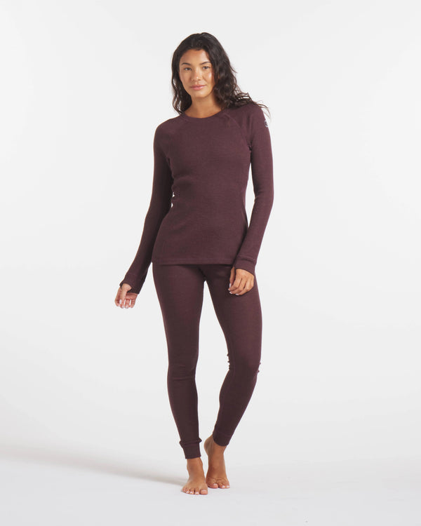 Full-body front view of Women’s 1.0 Thermal Crew showcasing rib-knit long-sleeve crew top and matching thermal leggings in uva dark purple on white background