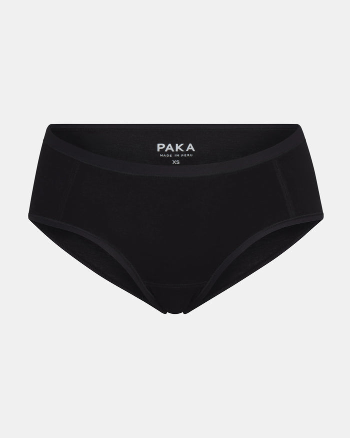 Front view of Women’s Essential Boy Short in black showing coverage and elastic waistband with visible PAKA logo