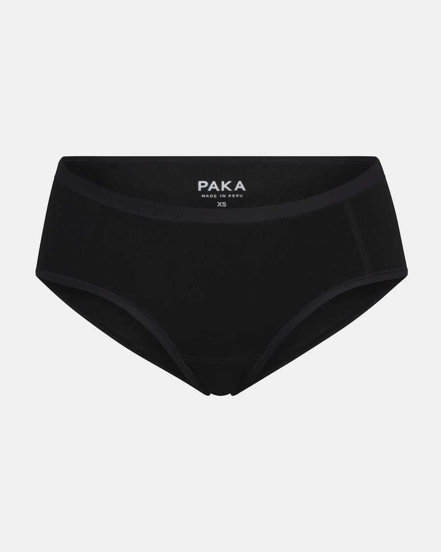 Front view of Women’s Essential Boy Short in black showing coverage and elastic waistband with visible PAKA logo