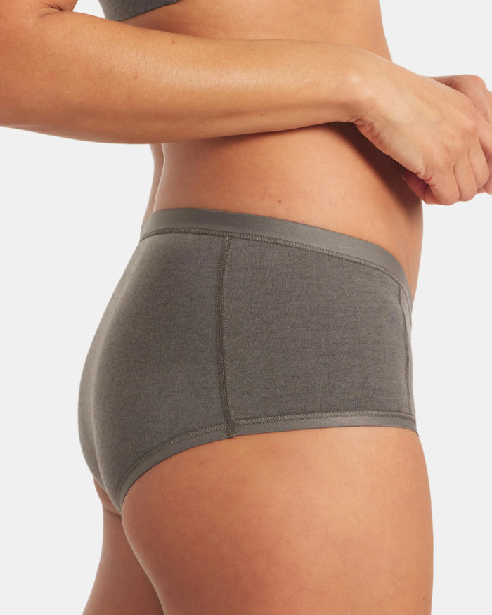 Side view of Women’s Essential Boy Short in forage on model, full-coverage mid-rise in organic cotton and alpaca