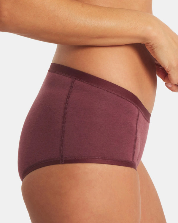 Side view of Women’s Essential Boy Short in raisin made from organic cotton and alpaca, showing full coverage fit and flat seams on a white background