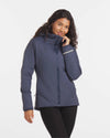 Model Smiling in Navy Women's Apu Lightweight Puffer Jacket with Alpaca Natural Fiber Insulation – PAKA Apparel