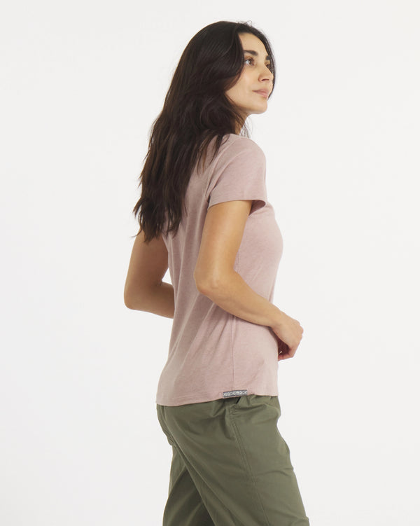 Three-quarter back view of Women’s Essential V-neck t-shirt in magnolia showing short sleeves, regular fit and side hem tag on white background