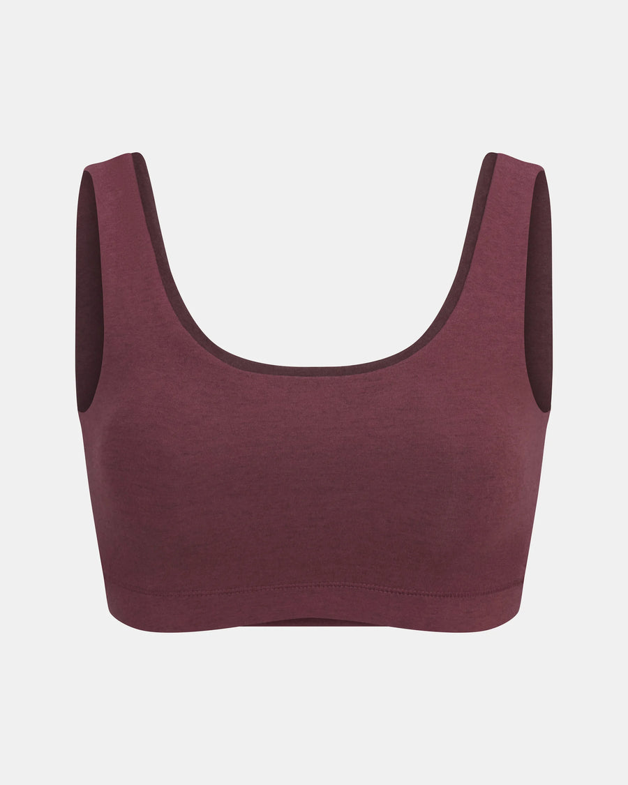 Front view of women’s scoop bralette in raisin showing scoop neckline, wide straps and seamless knit on light gray background
