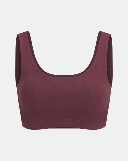 Front view of women’s scoop bralette in raisin showing scoop neckline, wide straps and seamless knit on light gray background