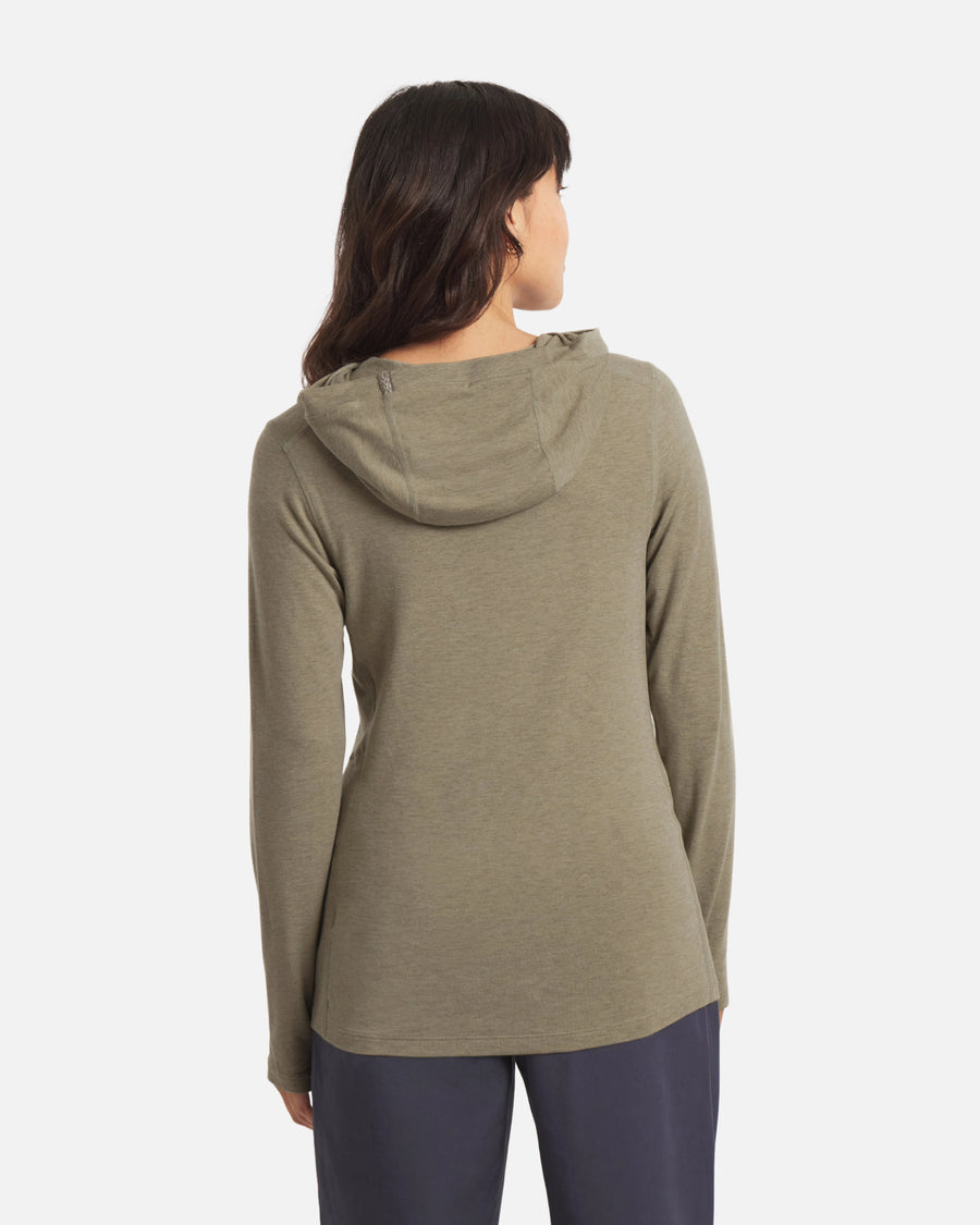 Rear view of Women’s Sol Hoodie in Elm showing three-panel hood and long sleeves on model against white background