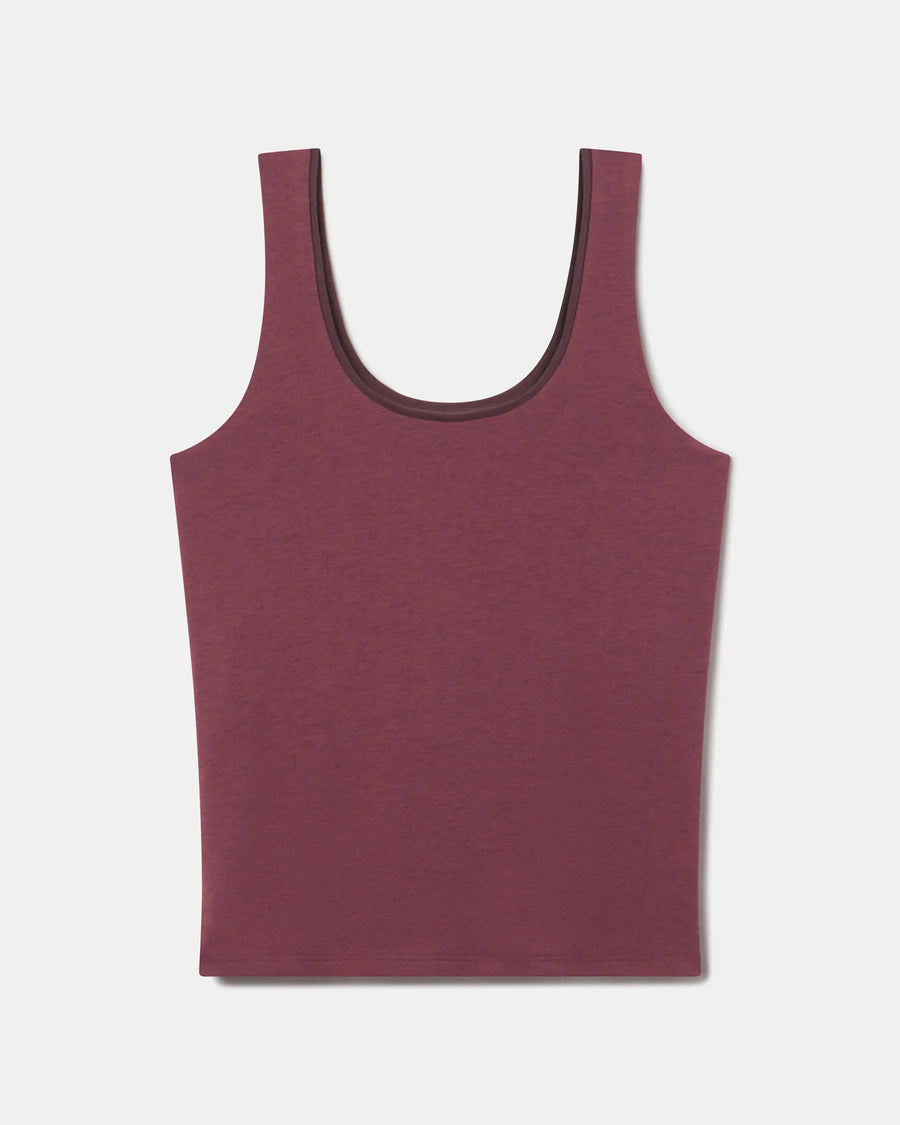 Flat lay of Women’s Essential Tank in raisin showing built-in shelf bra and scoop neck on light gray background