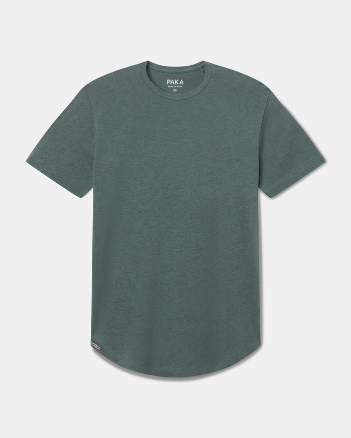 Front view of Women’s Essential Tee in Balsam showcasing crew neck and curved hem on light gray background
