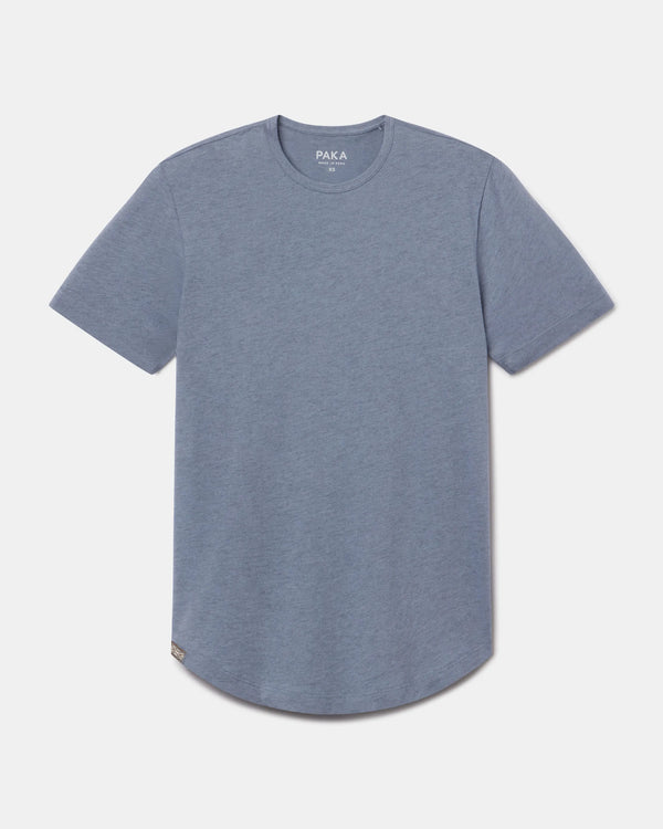 Front view of Women’s Essential Tee in bluestone, crewneck short-sleeve with curved hem on light gray background