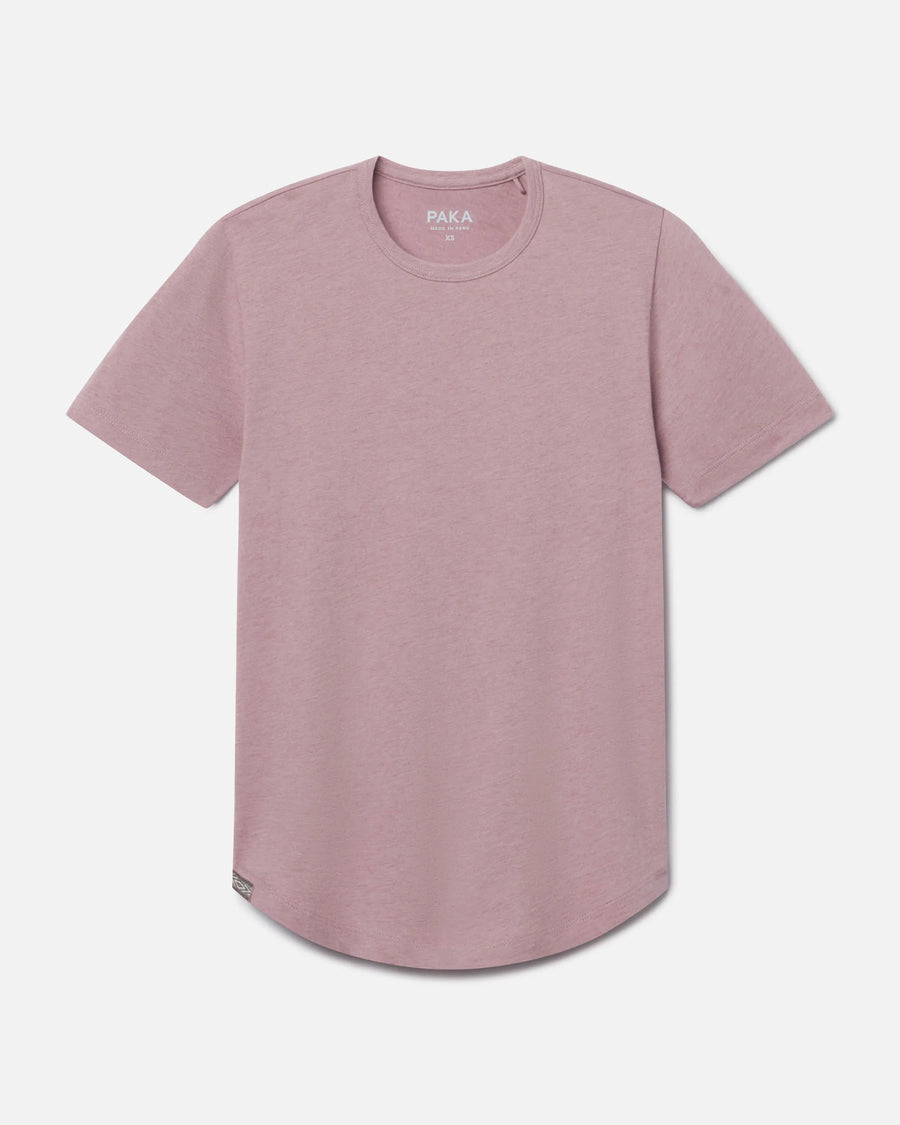 Front view of Women’s Essential Tee in woodrose showcasing curved hem and ribbed crewneck on light gray background