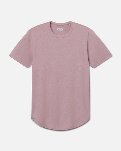 Front view of Women’s Essential Tee in woodrose showcasing curved hem and ribbed crewneck on light gray background