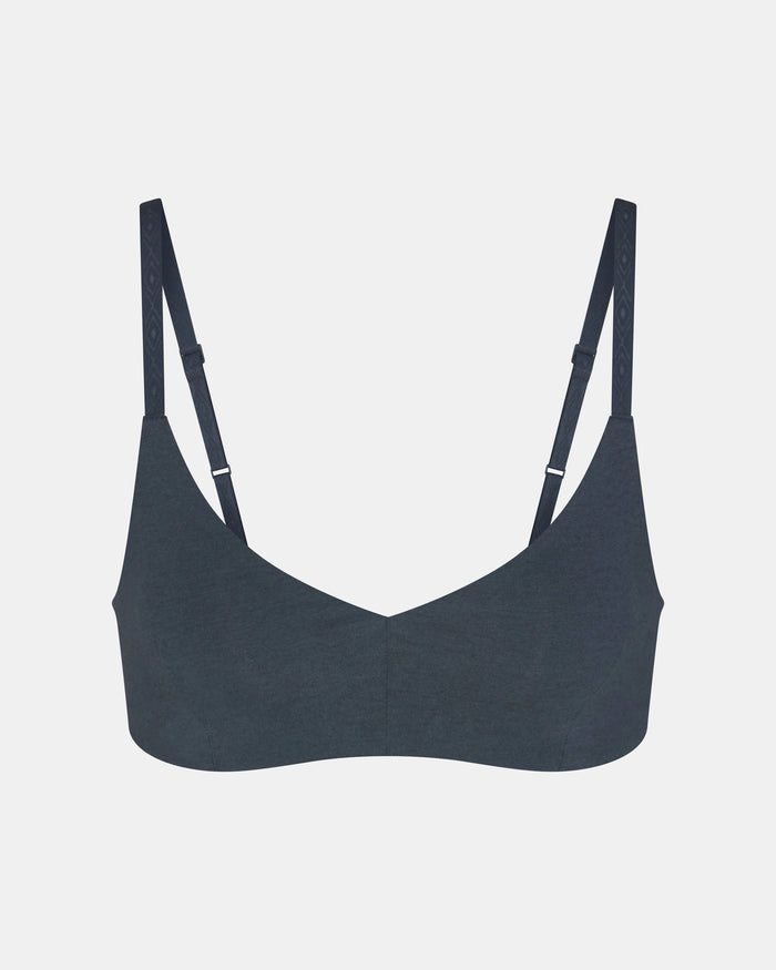 Front view of Women’s Essential Triangle Bralette in navy showing triangle cups and adjustable straps on light gray background