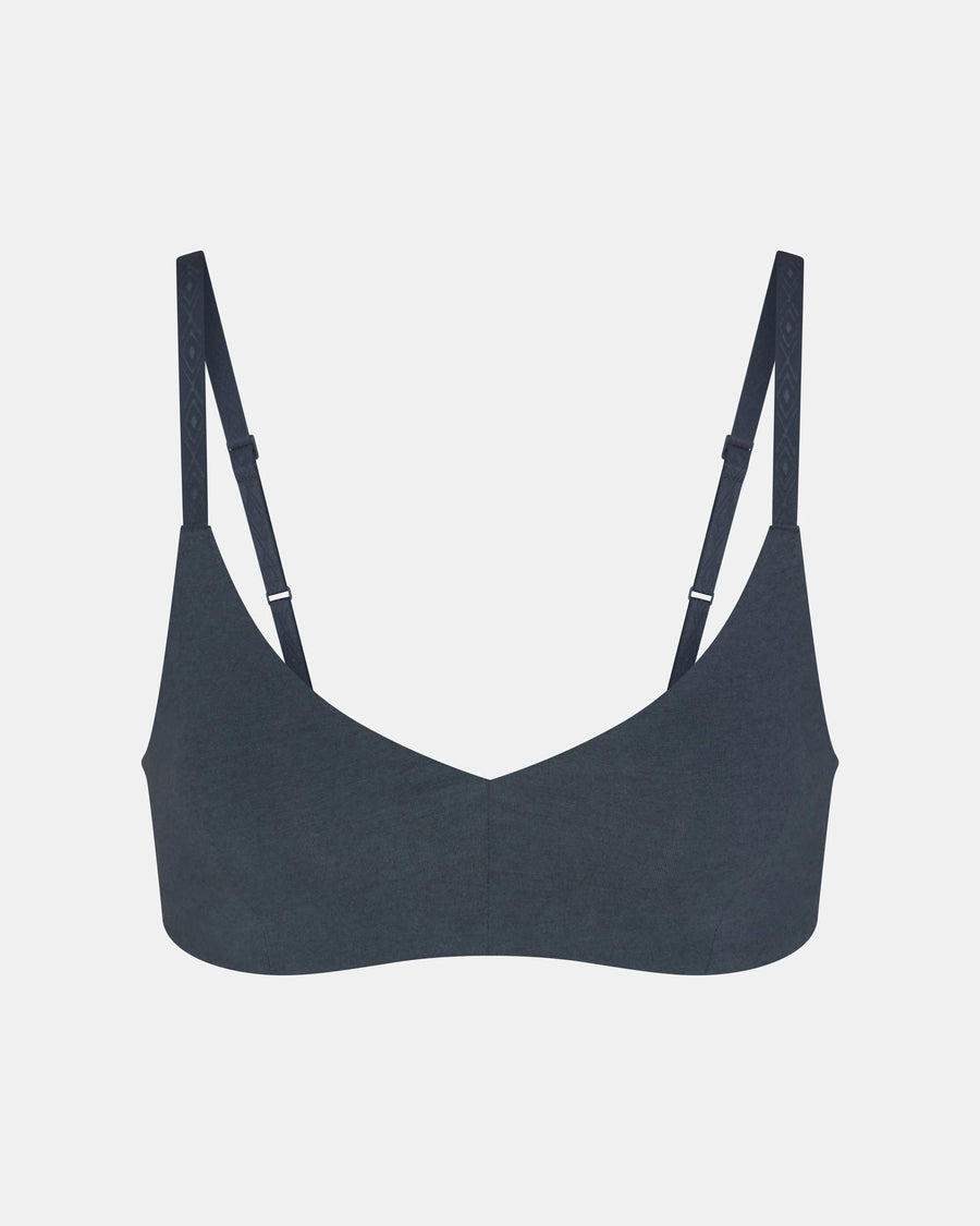 Front view of Women’s Essential Triangle Bralette in navy showing triangle cups and adjustable straps on light gray background