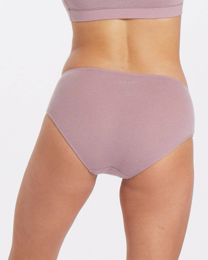 Rear view of Women’s Essential Mid-Rise Brief in Quail showing full-coverage mid-rise fit on model against white background