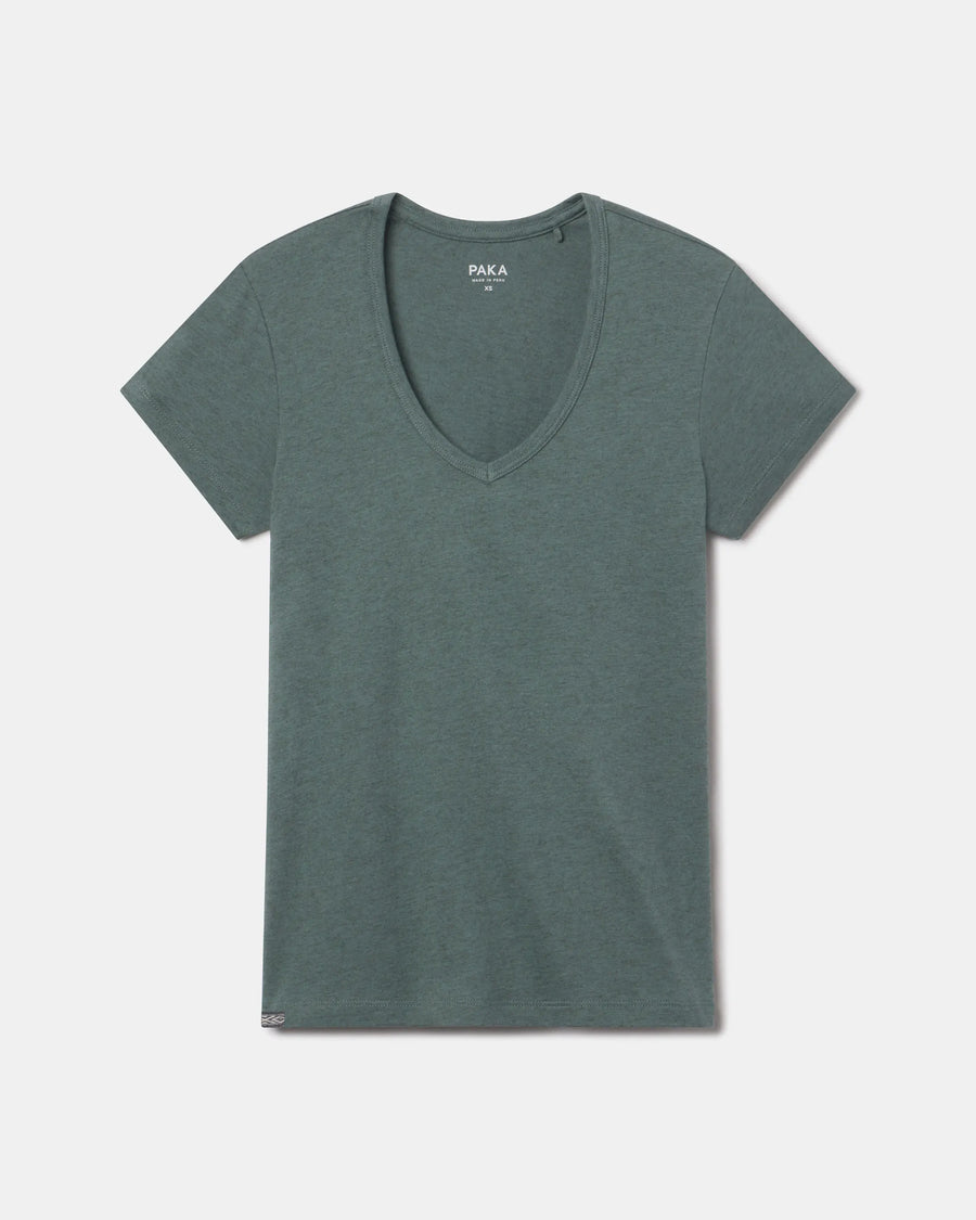Flat lay of women’s V-neck tee showcasing deep V neckline and short sleeves in balsam green on a light gray background