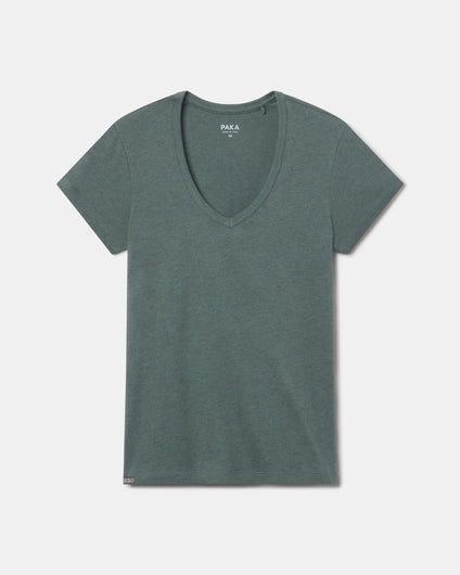 Flat lay of women’s V-neck tee showcasing deep V neckline and short sleeves in balsam green on a light gray background