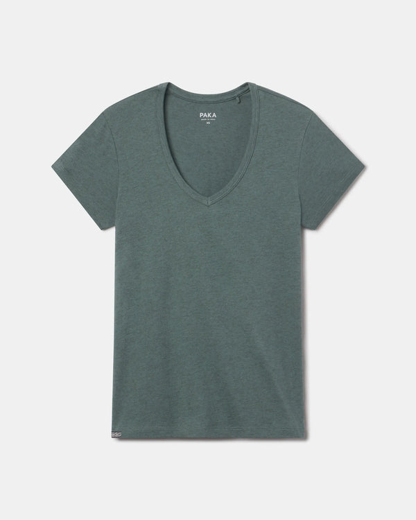Flat lay of women’s V-neck tee showcasing deep V neckline and short sleeves in balsam green on a light gray background