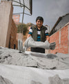 A man holding one of our Costa sweaters to air flat dry