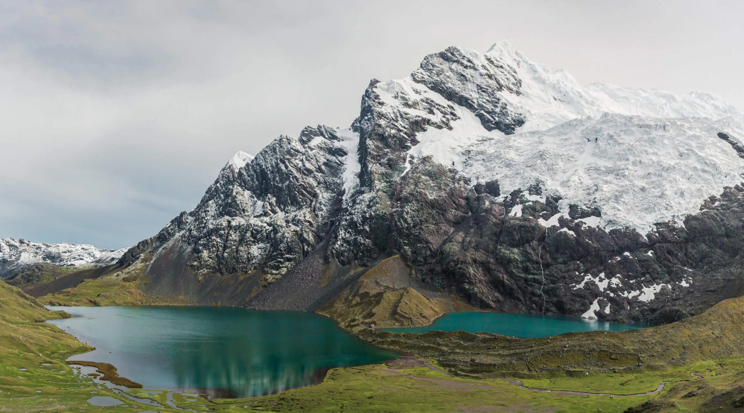 Ausangate a snowy mountain with blue lakes. 