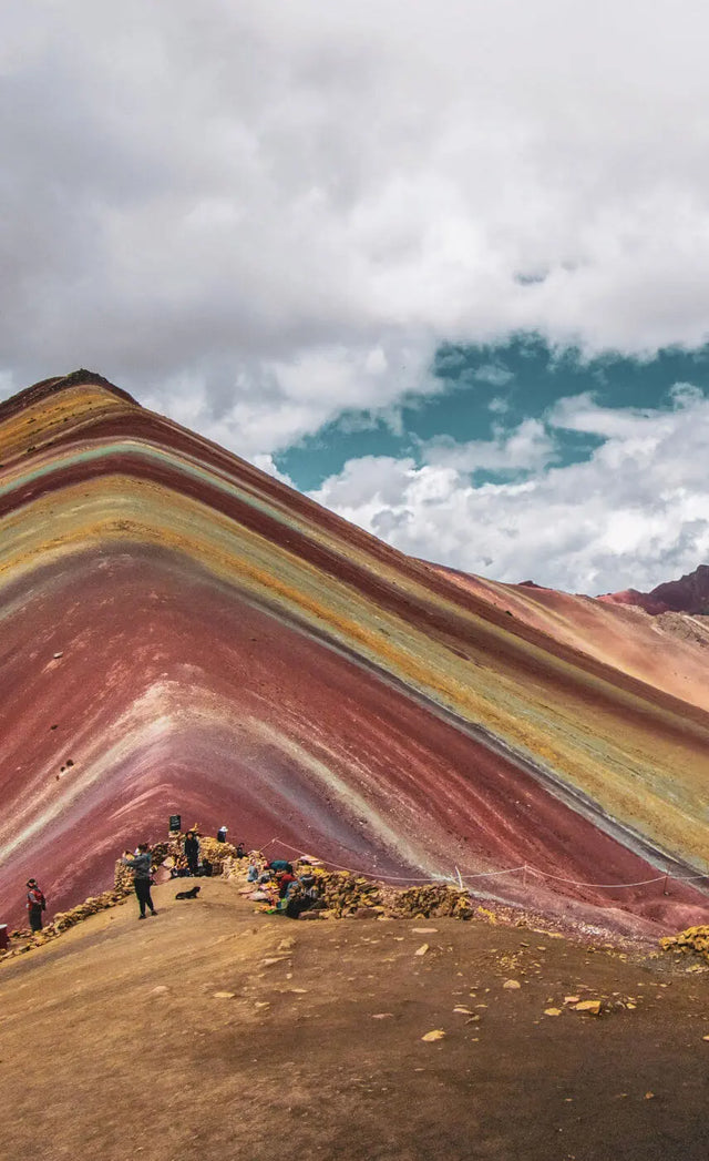 Rainbow mountain - a mountain with many colors - red yellow and blue.