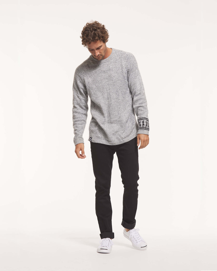 Timothy wearing the Men's Costa alpaca sweater by Paka Apparel