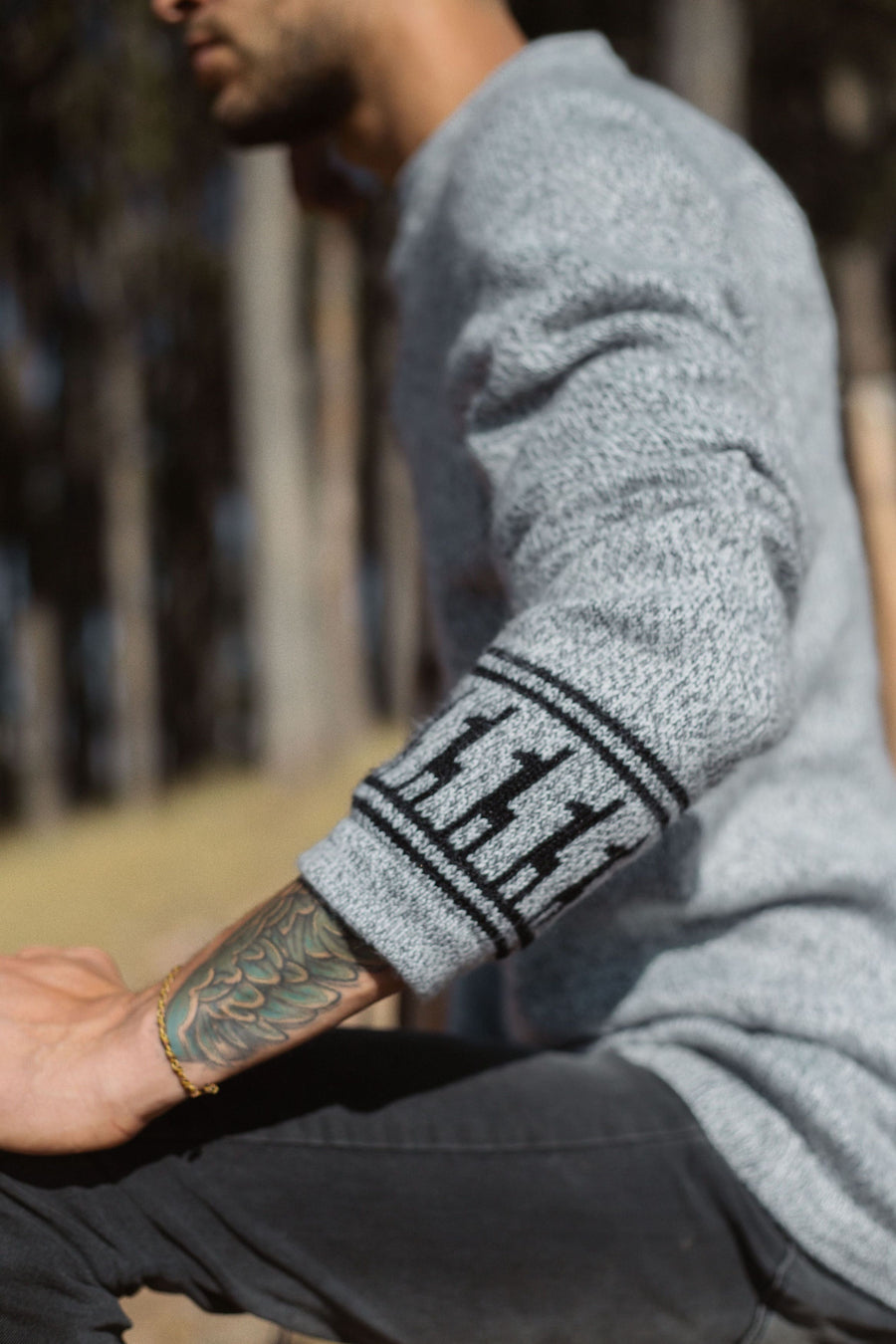 Close-up of alpaca sleeve design on the Costa on Male Model